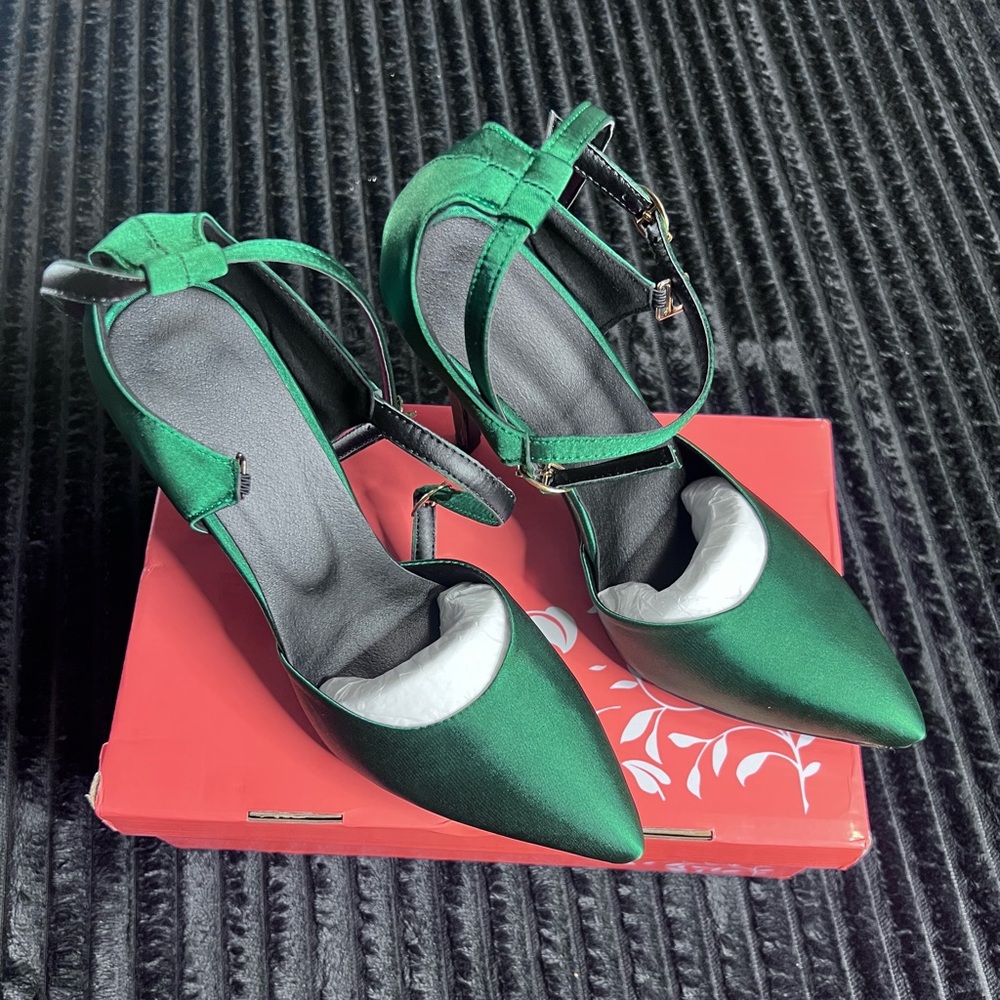 Green high heel shoes